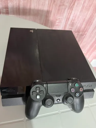 Ps4 fat 400 gb funcionando perfeitamente 