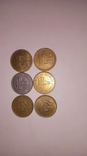 6 moedas de 25 centavos da Argentina, compostas de bronze alumínio.