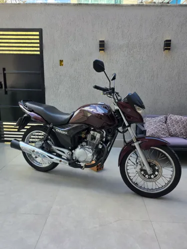 Oportunidade. Moto super revisada so pegar e andar. 9.999,00