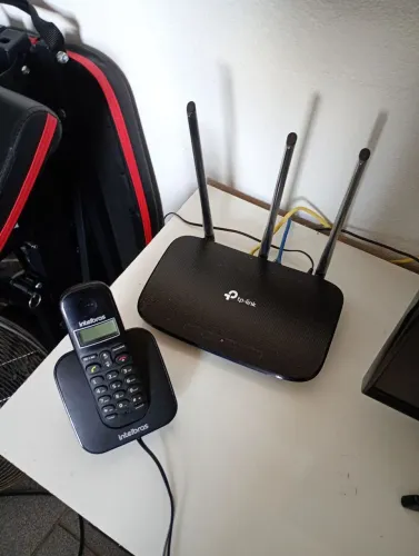 Vendo um modem extensão pra casa internet e um tefone sem fio ótimo estado 