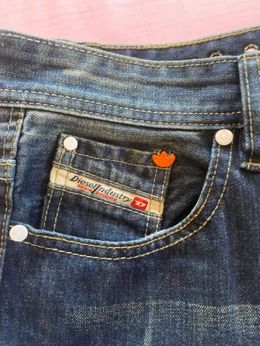 Calça jeans masculina Diesel c/ Adidas, edição especial Europa, tam. 48