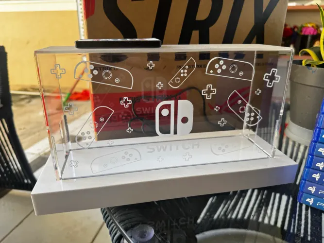 Caixa acrílica antipoeira com base luminosa - Nintendo Switch 1