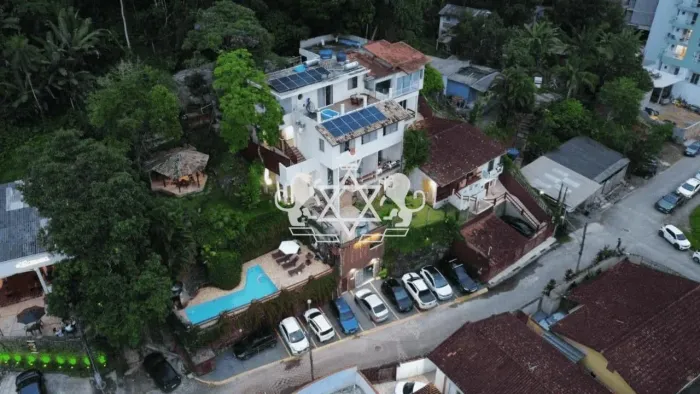 Prédio comercial com piscina à venda, 600 m² - Praia Grande, Ubatuba