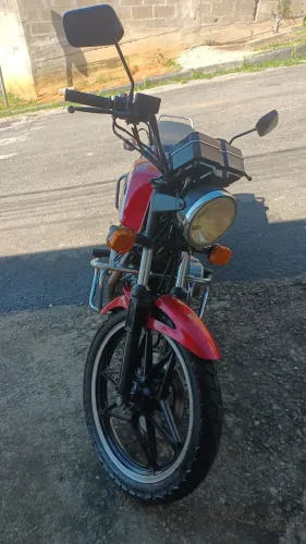 Vendo ou troco moto muito conservado pelo ano dela