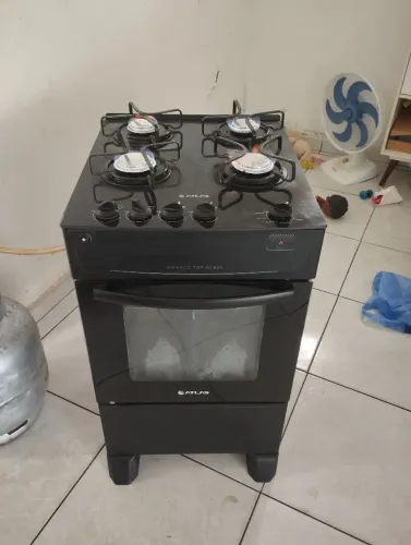 Vende-se fogão 4 bocas mesa de vidro não er automático entrega grátis 3 meses de garantia