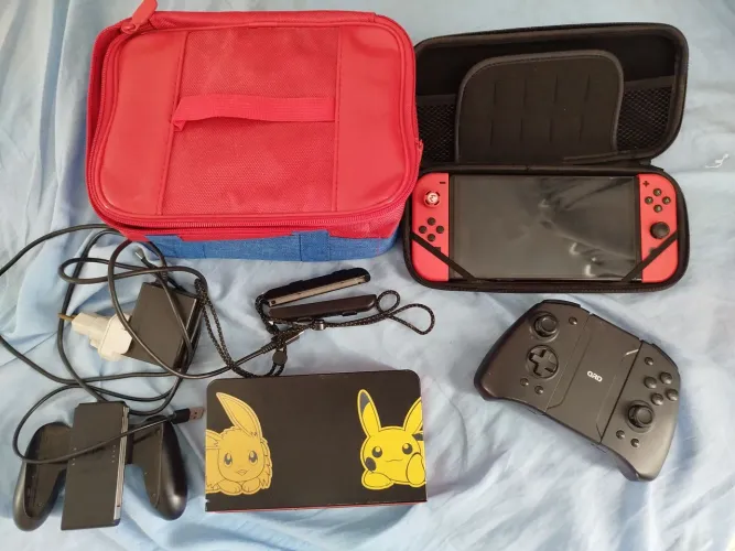 Nintendo switch OLED vermelho desbloqueado + cartão 256gb+ case e bag + pro controle joy