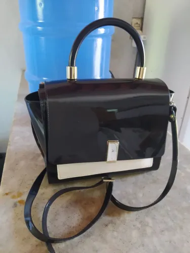 Bolsa da petite Jolie 40$. <br>De 80 por 66$ avist