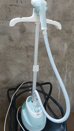 Passadeira de roupas a vapor