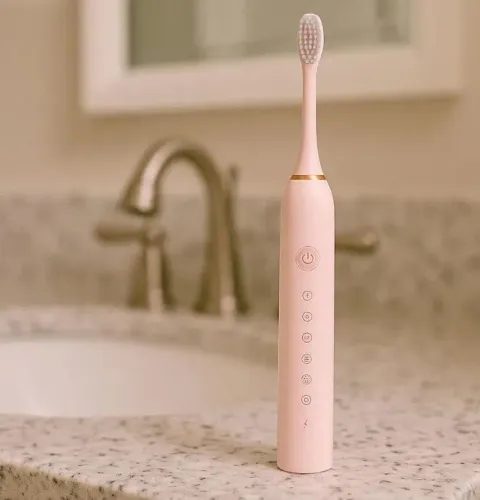 Escova de dente elétrica, recarregável.