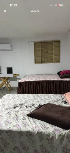 Procuro menina pra dividi quarto em uma casa