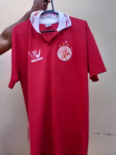 Camisa America Natal-RN de viagem ano 2002 original Wecker,tamanho G escudo emborrachado