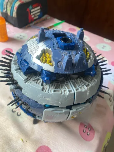 Boneco Transformers Cybertron Primu