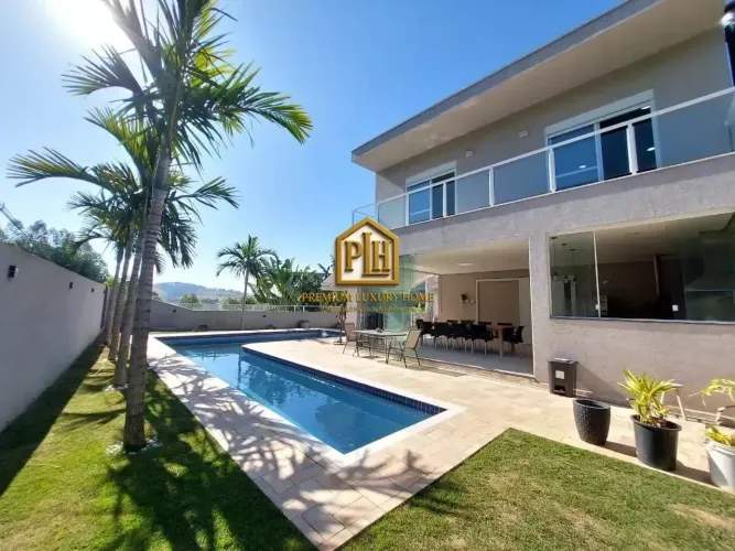 CASA DE CONDOMINIO FEHCADO COM 3 SUITES EM ATIBAIA