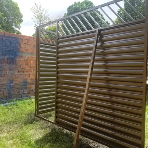 PORTÃO DE GARAGEM O MATERIAL TODO NO GALVANIZADO 