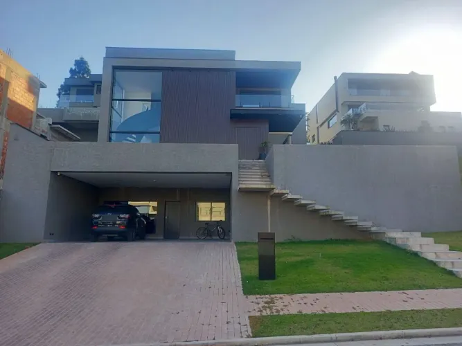 Casa com 4 dormitórios à venda, 397 m² por R$ 4.780.000 - Alphaville Granja Viana - Granja