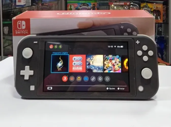Nintendo Switch Lite - Aceitamos video games como parte do pagamento.