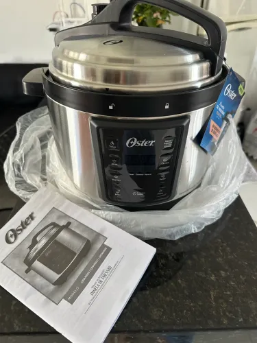 Panela de pressão elétrica Oster nova 