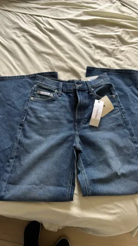 Calça jeans Calvin Klein modelo ultra high wide leg