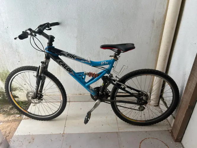 Bicicleta Caloi Aro 26 | 21v Shimano | Freio a Disco | Alumínio | Suspensão Dupla