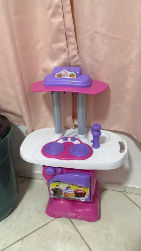 Brinquedo gangorra e fogão