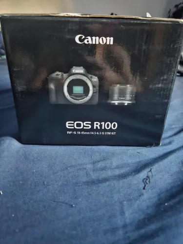 Camera canon EOS R100 nunca usada vai com cartão de memoria de 128 gb