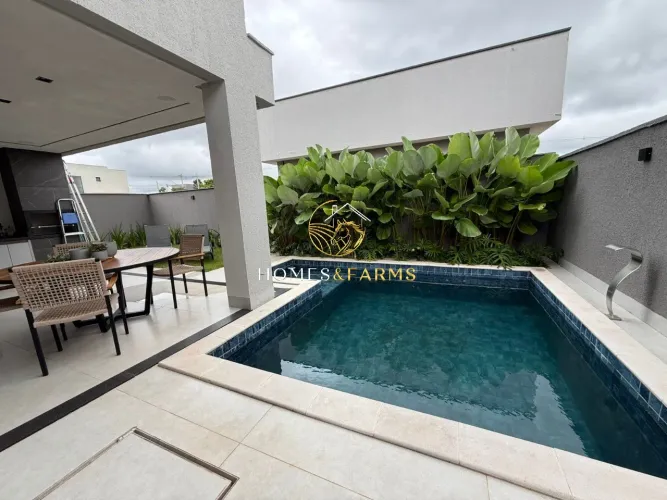 Sobrado mobiliado para locação no Terras Alpha 2, 4 suítes e piscina aquecida