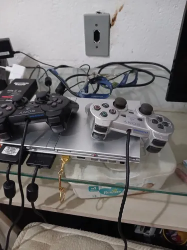 Ps2 prata reliquia dois controles Sony originais 3 pen drive cheios de jogos dois memory