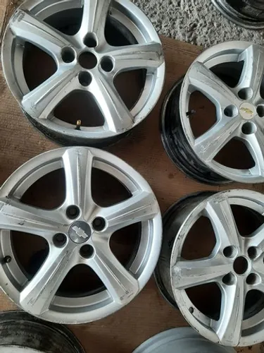Roda aro 15 estrela prata chevrolet corsa 4x100 jogo
