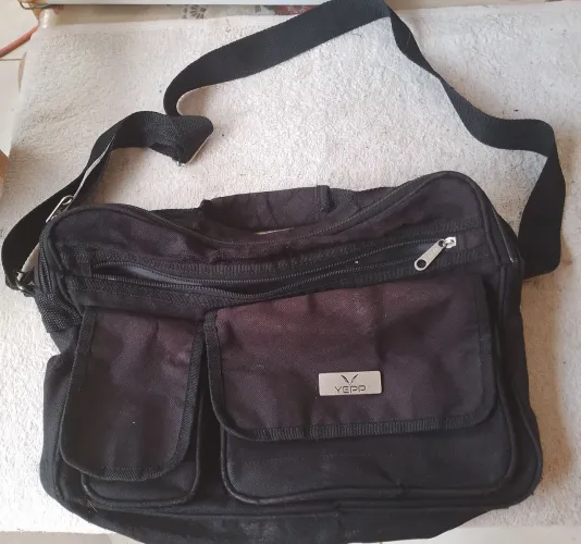 Bolsa masculina usada 