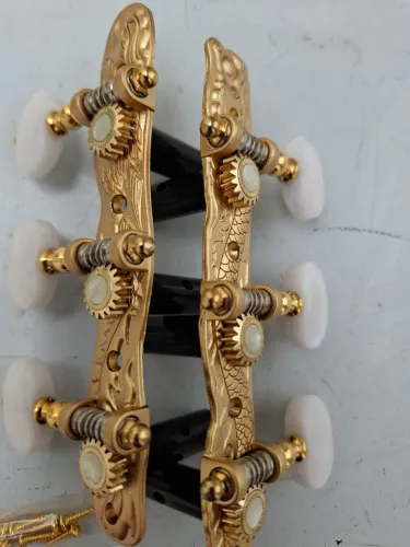 Tarraxas Der Jung Dragon 6 cordas nylon 18 dentes dourada luxo.