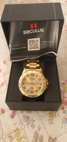 Vende-se Relógio Seculus Dourado com nota fiscal.