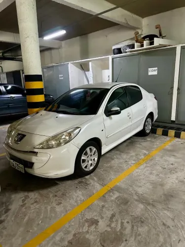 Peugeot 207 Sedan Passion XR 1.4 Flex 8V 4P 2013