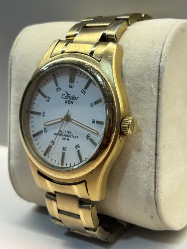 Relógio Condor New All Steel - Resistente, Dourado e Pronto para Tudo (100M)