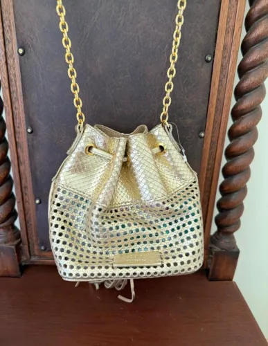 Bolsa Schutz dourada NOVA