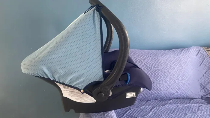 Bebê conforto conservado