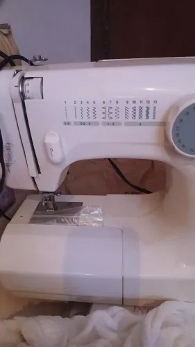 Elgin Genius JX-4000, com o seletor de pontos e a logomarca da Elgin visíveis.