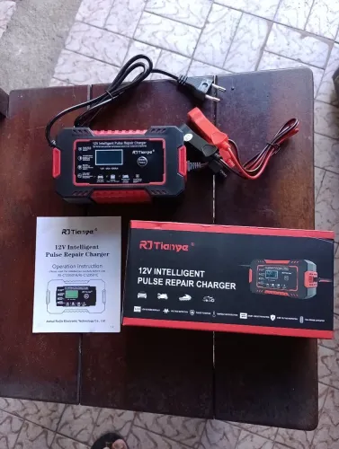 CARREGADOR DE BATERIA DE CARRO E MOTO NOVO 