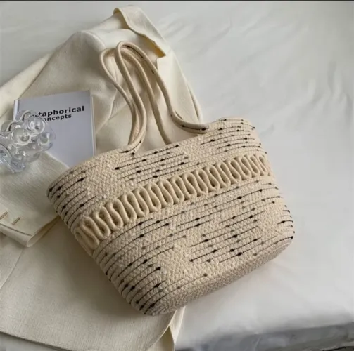 Bolsa elegante feita de cordas de algodão macramé 