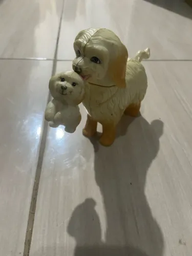Cachorrinho com filhote da Barbie
