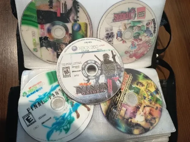 lote de quase 40 jogos de xbox 360 desbloqueado, alguns contendo arranhões no disco