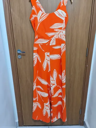 Macacão novo nunca usado Tam GG mas veste um tamanho G perfeito 