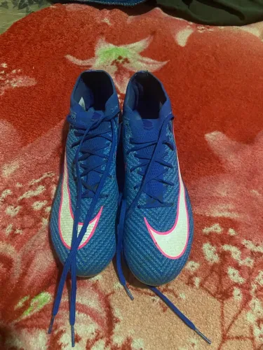 Chuteira Nike, aceito PS2 na troca.