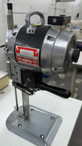 Máquina de corte tecido