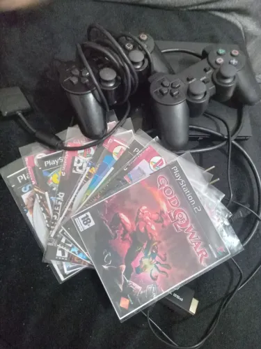 play 2 , 1 controle original 1 sem fio , 8 jogos , memóri card , só jogar