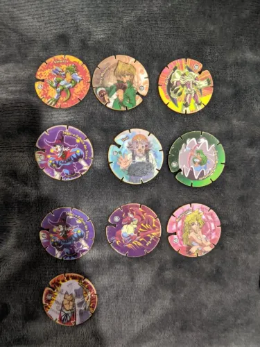 Tazos yugioh arma e voa