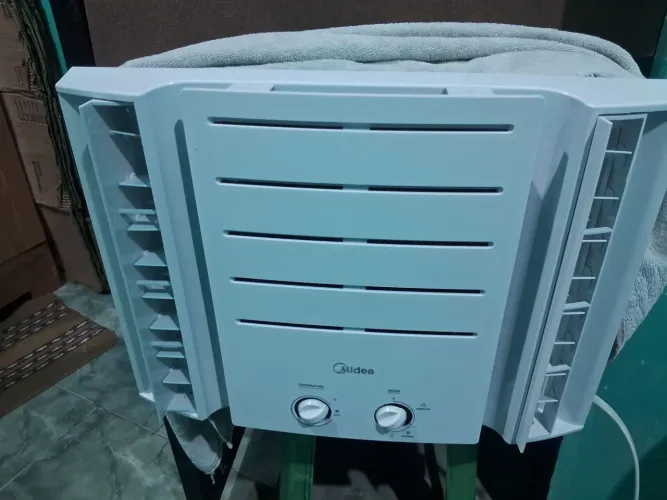 Vendo ou troco pornum ar portatil 7500btus 110vts novo na ?