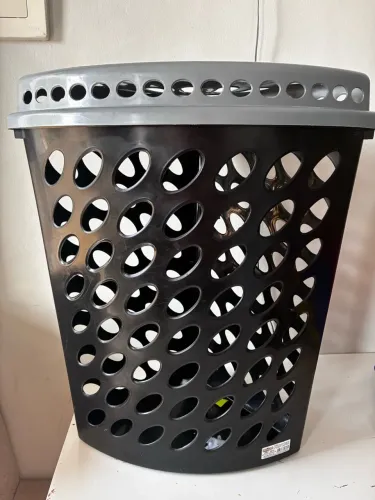 Cesto de roupa de quina