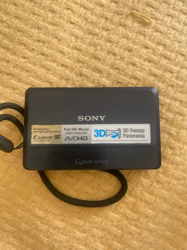 Máquina digital Sony com carregador 