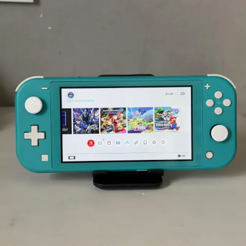 Nintendo Switch Lite Turquesa Desbloqueado 128g Usado (sem carregador /caixa)