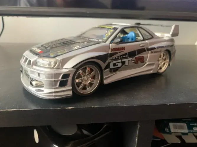LEIA O ANUNCIO Miniatura de carro CUSTOMIZADA Nissan Skyline GT-R R34 KENTOYS escala 1/24 